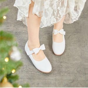 Girls White Shoes. Mary Jane’s with bow strap.